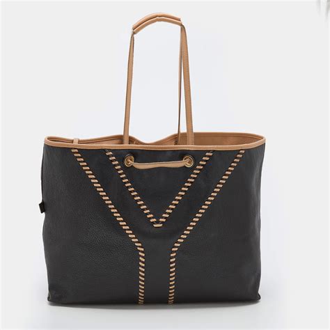 ysl reversible tote in black and beige leather|YSL tote bag price.